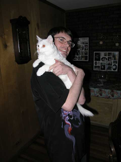 Mike and his beloved feline companion, Mister White.